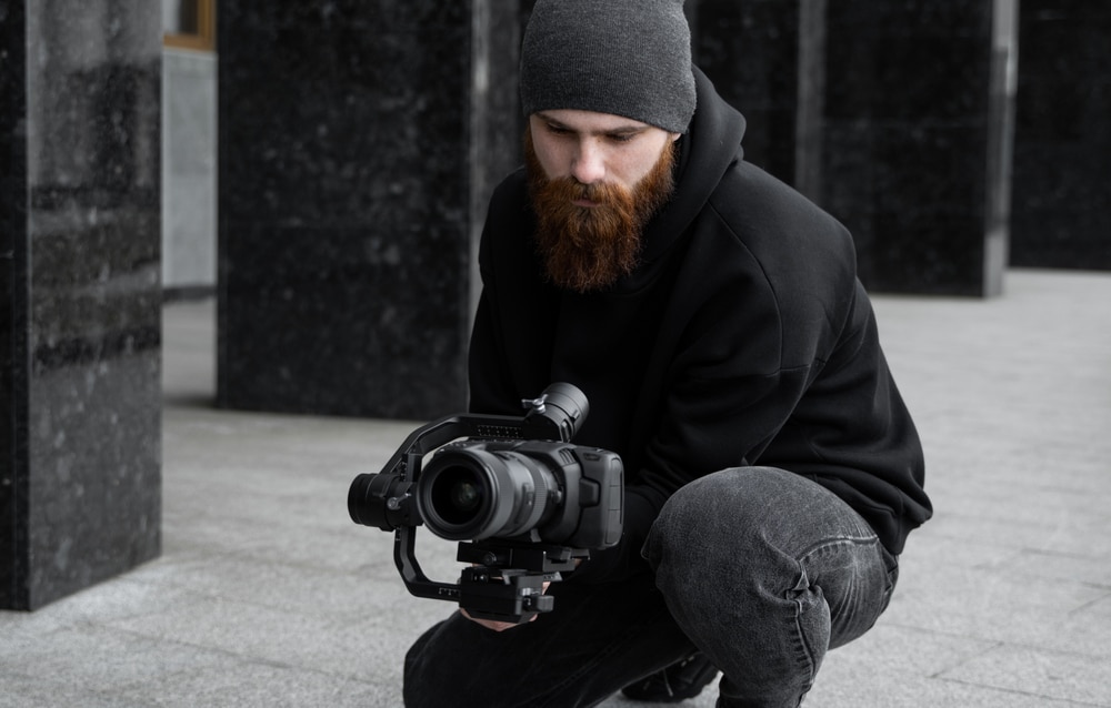 Male freelance videographer